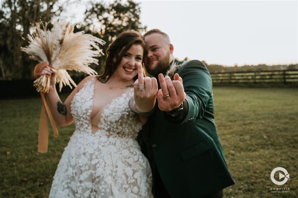 Bride and groom outdoor photos at the Edison Barn in Dade City, Florida.