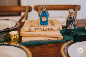 Harry Potter wedding decor detail photos at The Edison Barn in Tampa Bay.