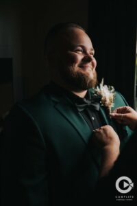 Groom portrait at The Edison Barn Tampa Bay by Complete Weddings + Events Tampa Bay.